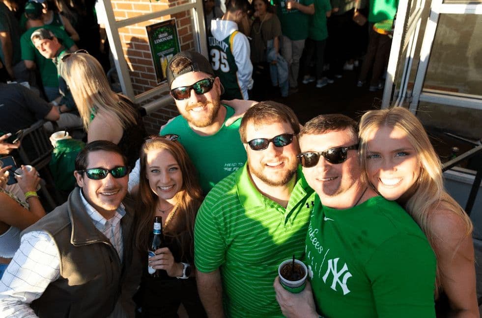 A crowd celebrating at Innisfree